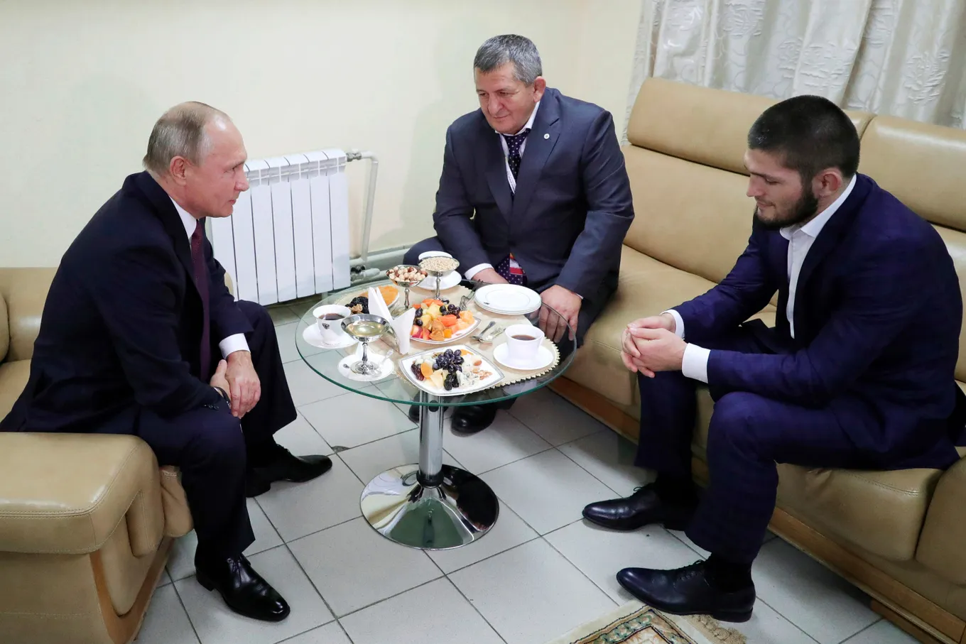 Владимир Путин, Абдулманап и Хабиб Нурмагомедовы