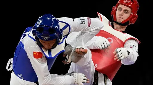 Олимпийский чемпион по тхэквондо Ларин: болею за всех наших ребят в UFC