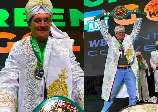 Усик устроил фотосессию с поясом WBC, принадлежащим Фьюри