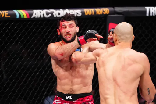 Бекоев потерпел первое поражение в UFC в бою с Белгаруи