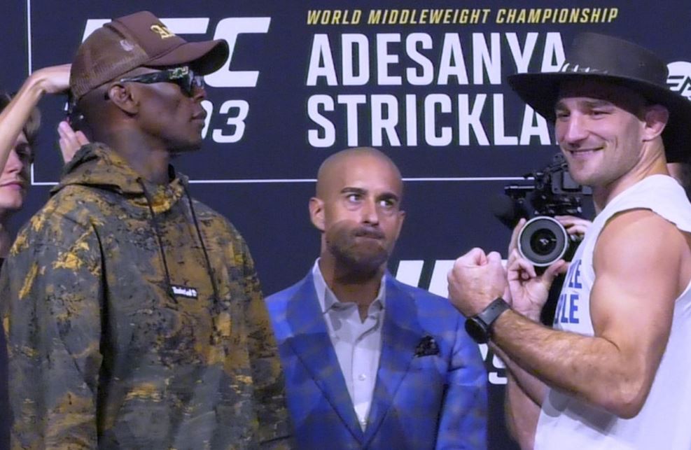 Адесанья и Стрикленд встретились лицом к лицу перед титульным боем на UFC 293 в Сиднее
